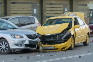 Car accident with significant damage to both vehicles